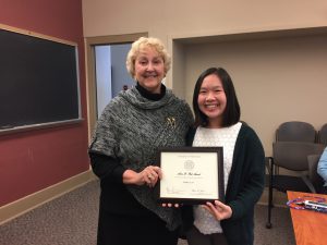 Natalie Low receiving Anne D. Pick Award for an Outstanding Child Psychology Major