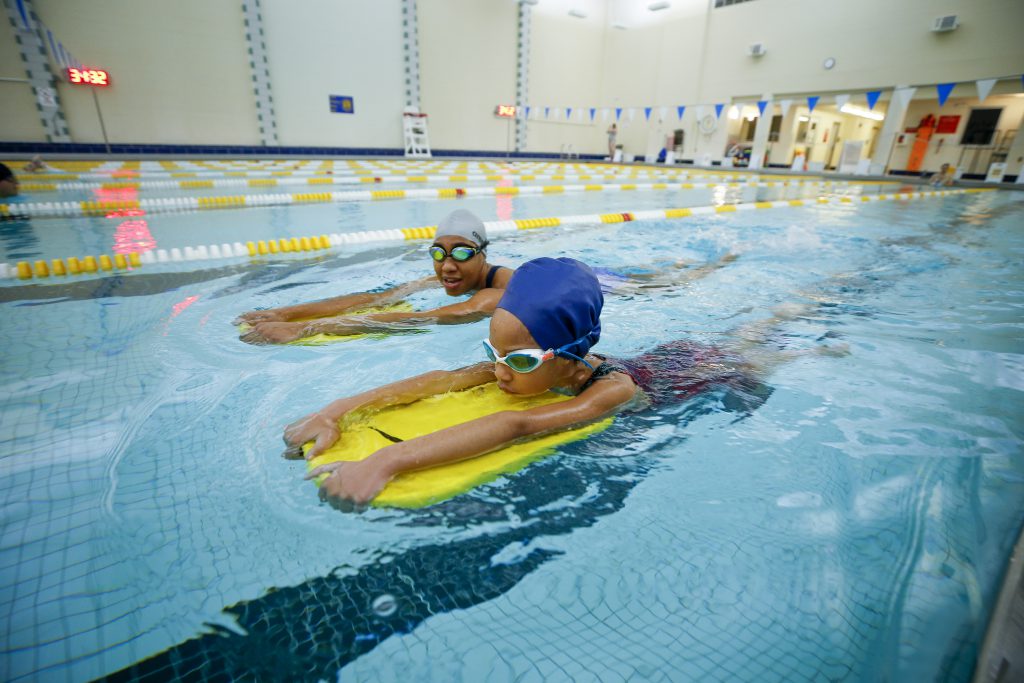 Ayanna swimming with her daughter