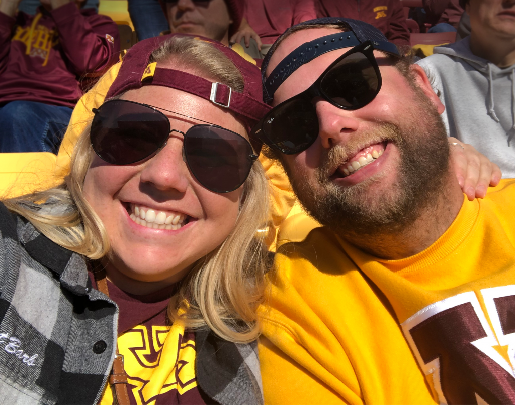 Cara at Gopher game with partner